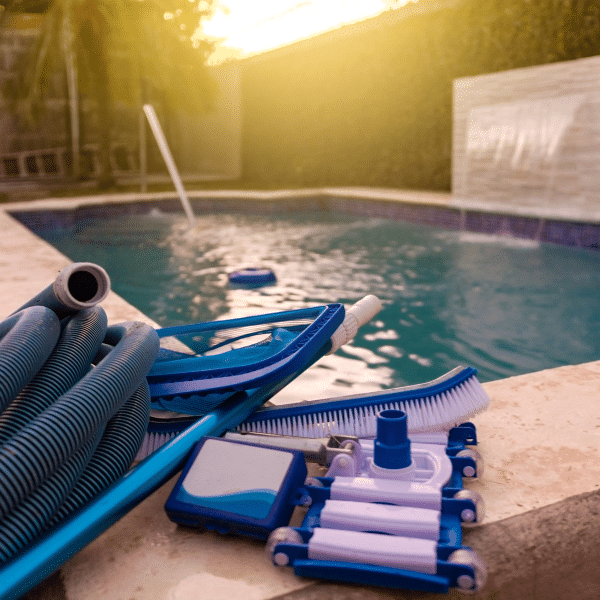 Pool service expert testing water balance before winter closing