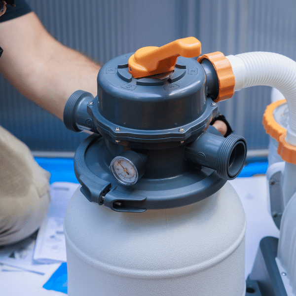 Different types of swimming pool pumps on display for homeowners