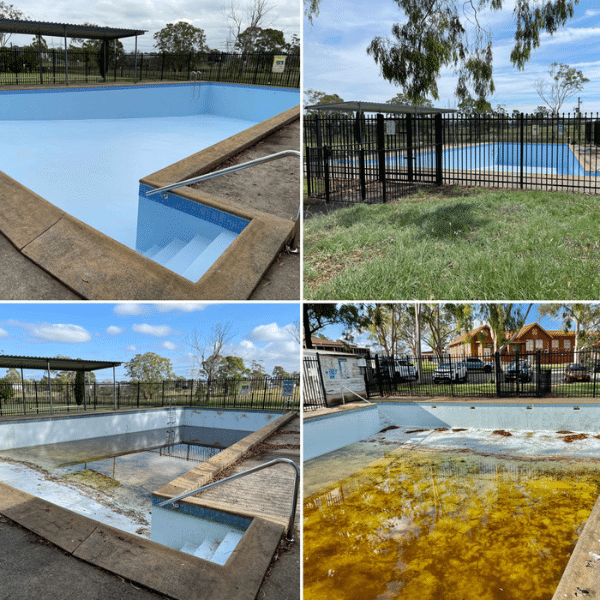 Middle-aged man wearing a yellow safety vest and hard hat stands at a construction site, holding a cable. Buildings and cranes are visible in the background, highlighting the expertise of commercial pool builders at work.